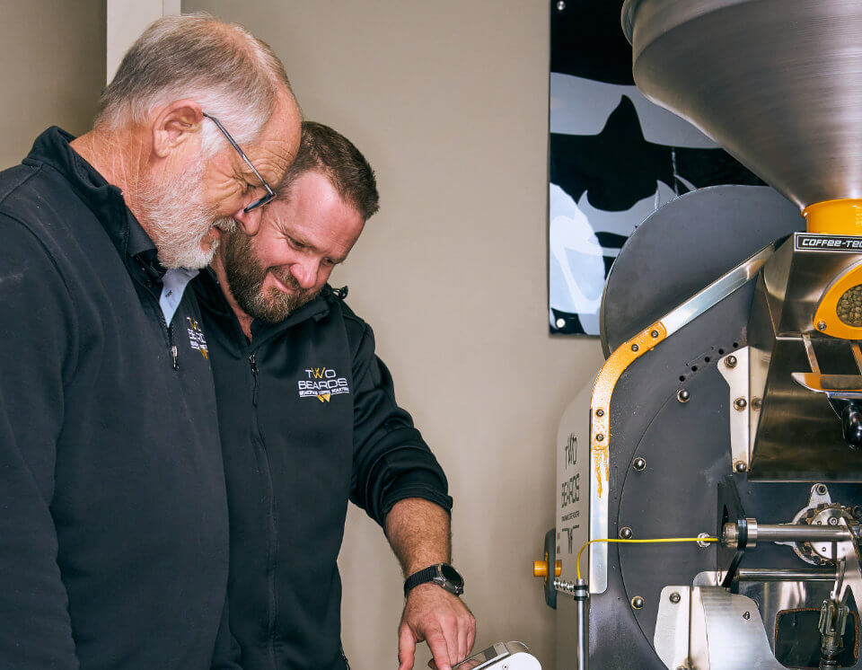 Roy and Mark magically scrutinise the brewing process on one of the state-of-the-art roasting machines.